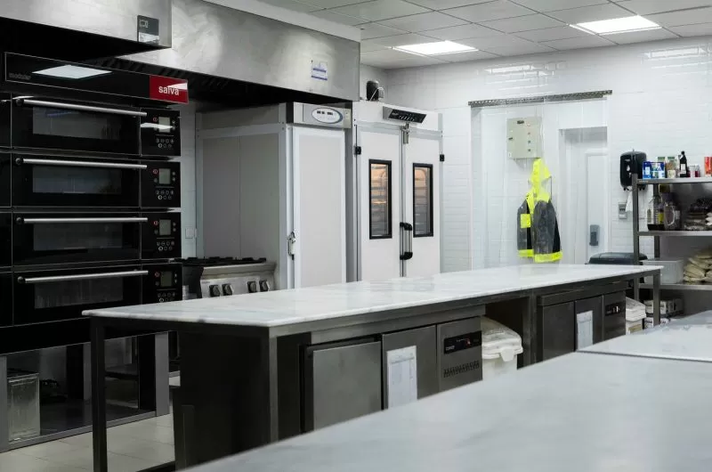 Bakery corner with ovens and proofers in the Plum kitchen
